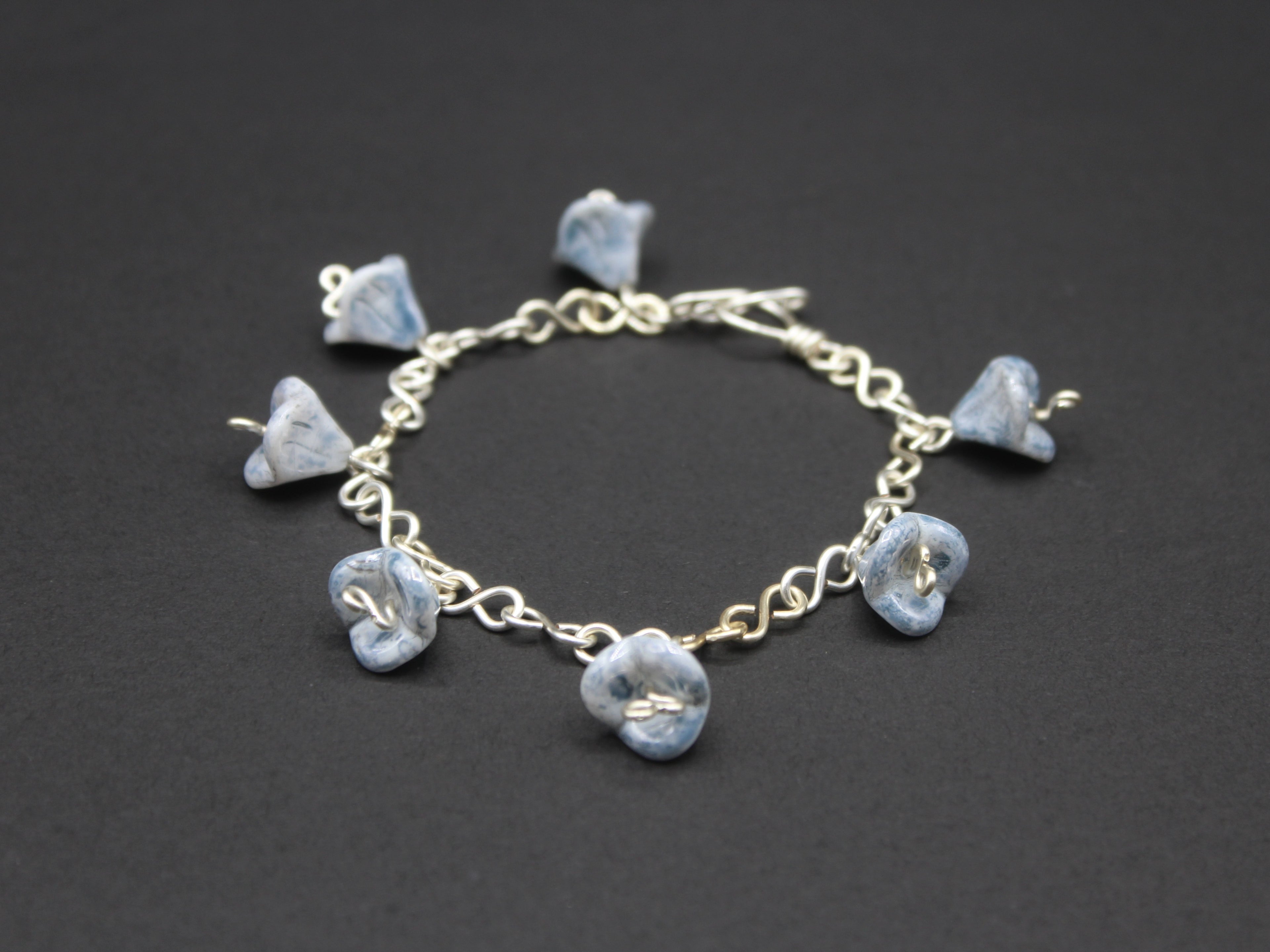 Handcrafted Blue Czech Glass Bell Flower Bracelet in Silver Plated Wire, 7.00"
