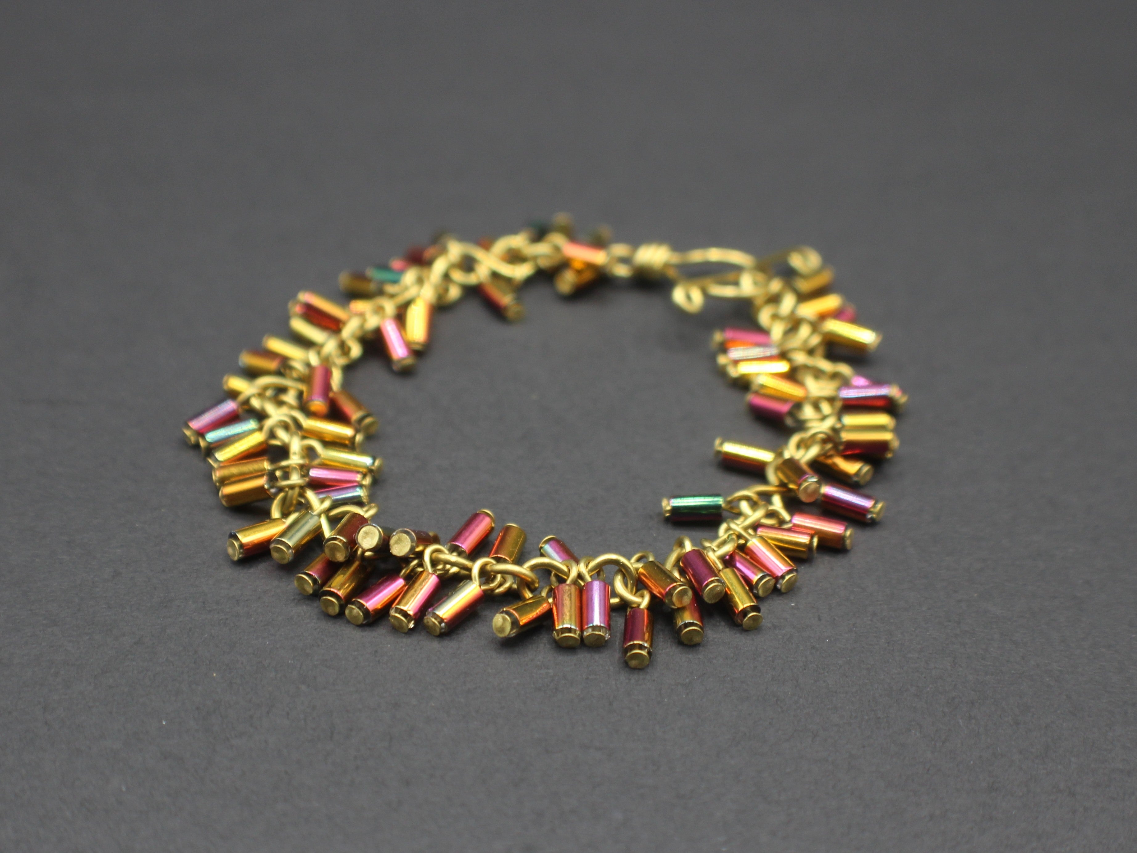 Handcrafted Brass Bracelet with Metallic Glass Tube Beads, 6.75"