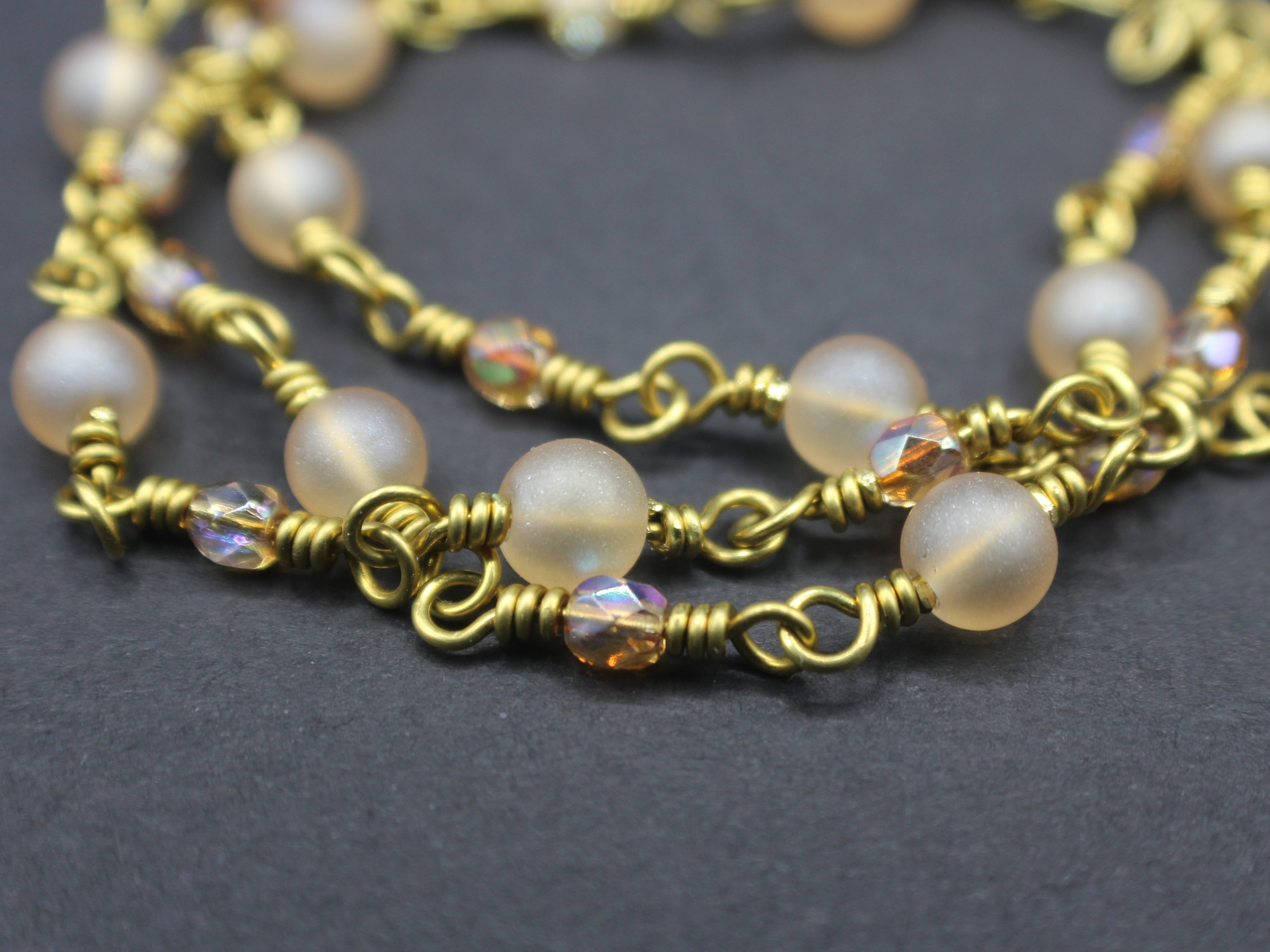 Handcrafted Triple Strand Frosted Glass and Faceted Bead Bracelet in Brass, 6.5"