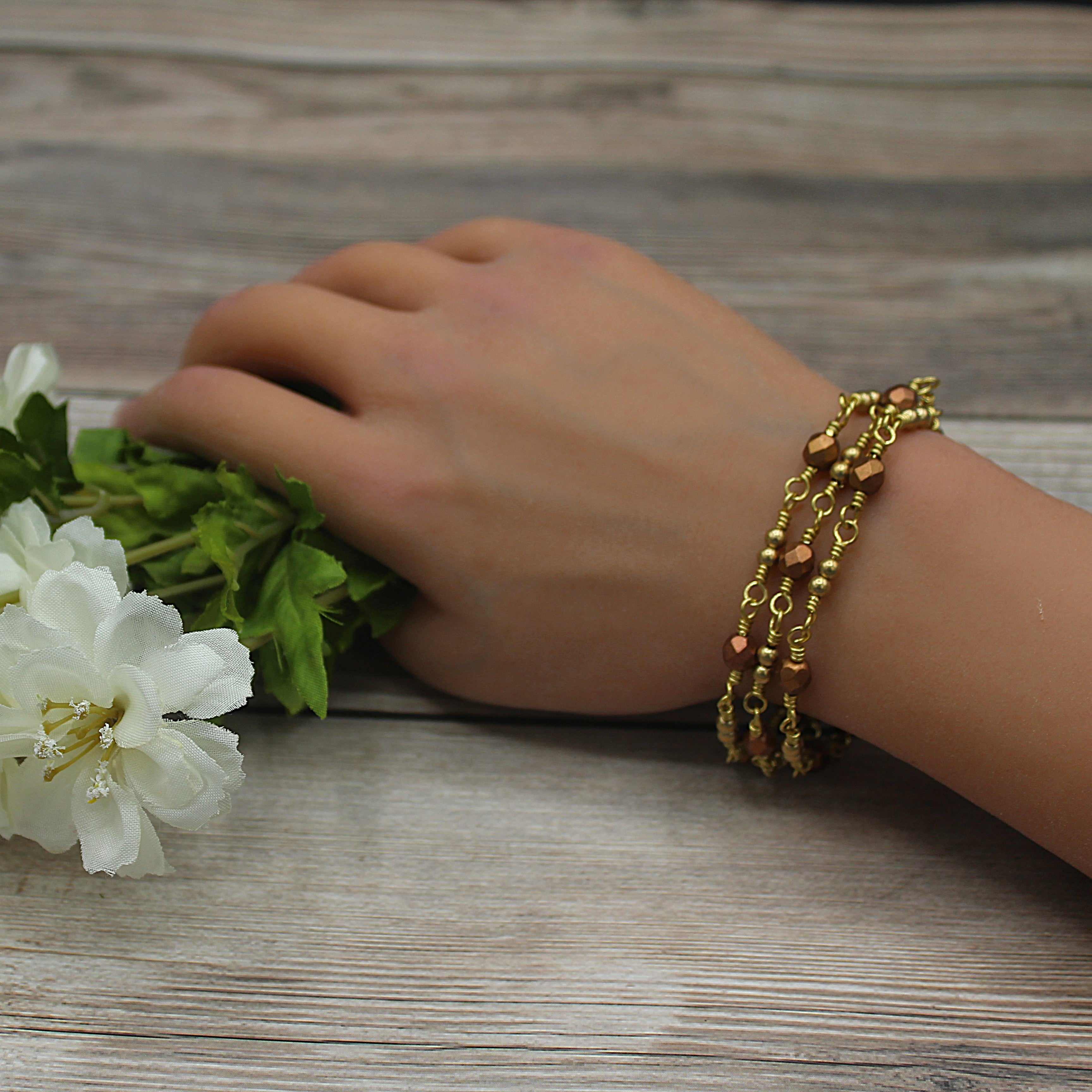 Handcrafted Triple Strand Metallic Faceted Glass and Brass Bracelet with Toggle Clasp, 6.5"