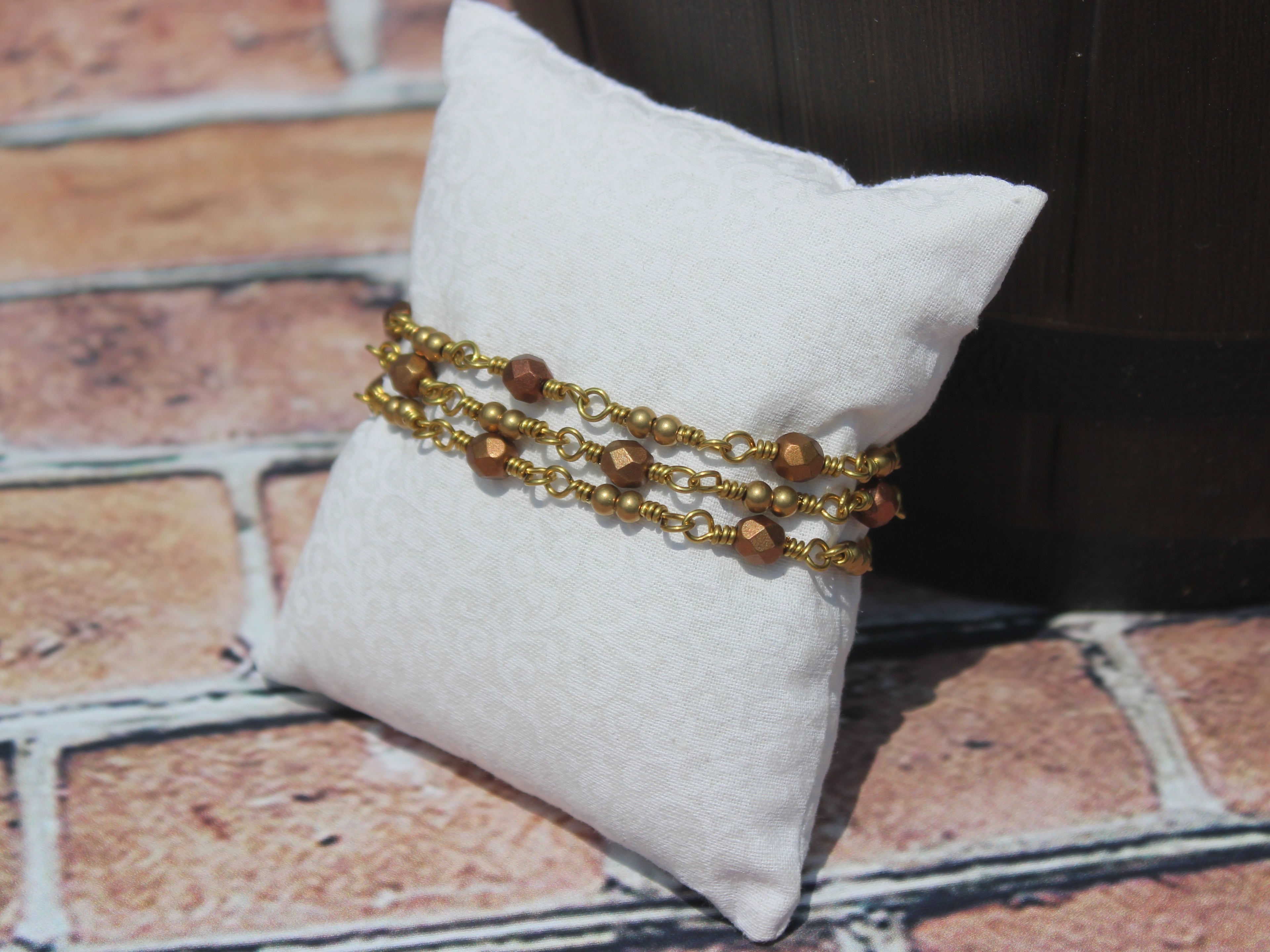 Handcrafted Triple Strand Metallic Faceted Glass and Brass Bracelet with Toggle Clasp, 6.5"