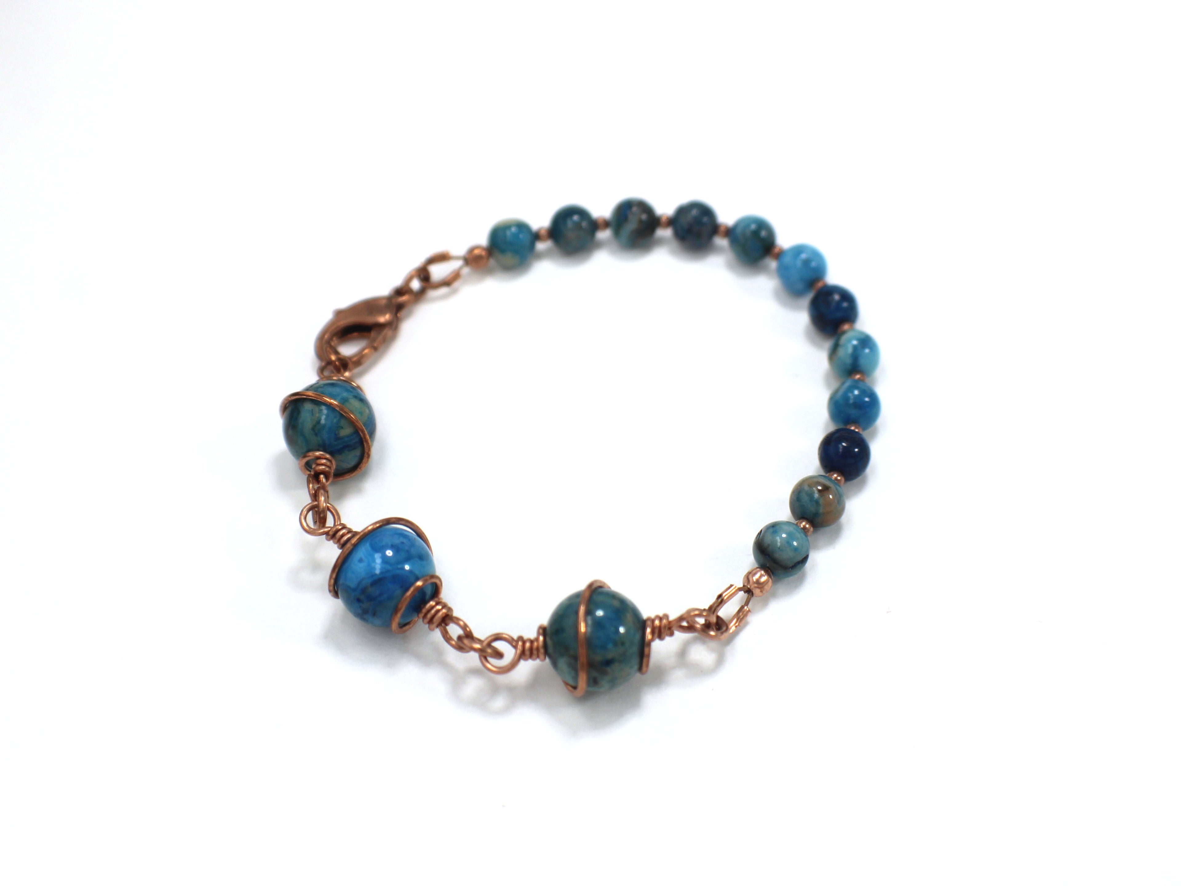 Handcrafted Asymmetrical Blue Crazy Lace Agate Bracelet in Copper, 7.00"