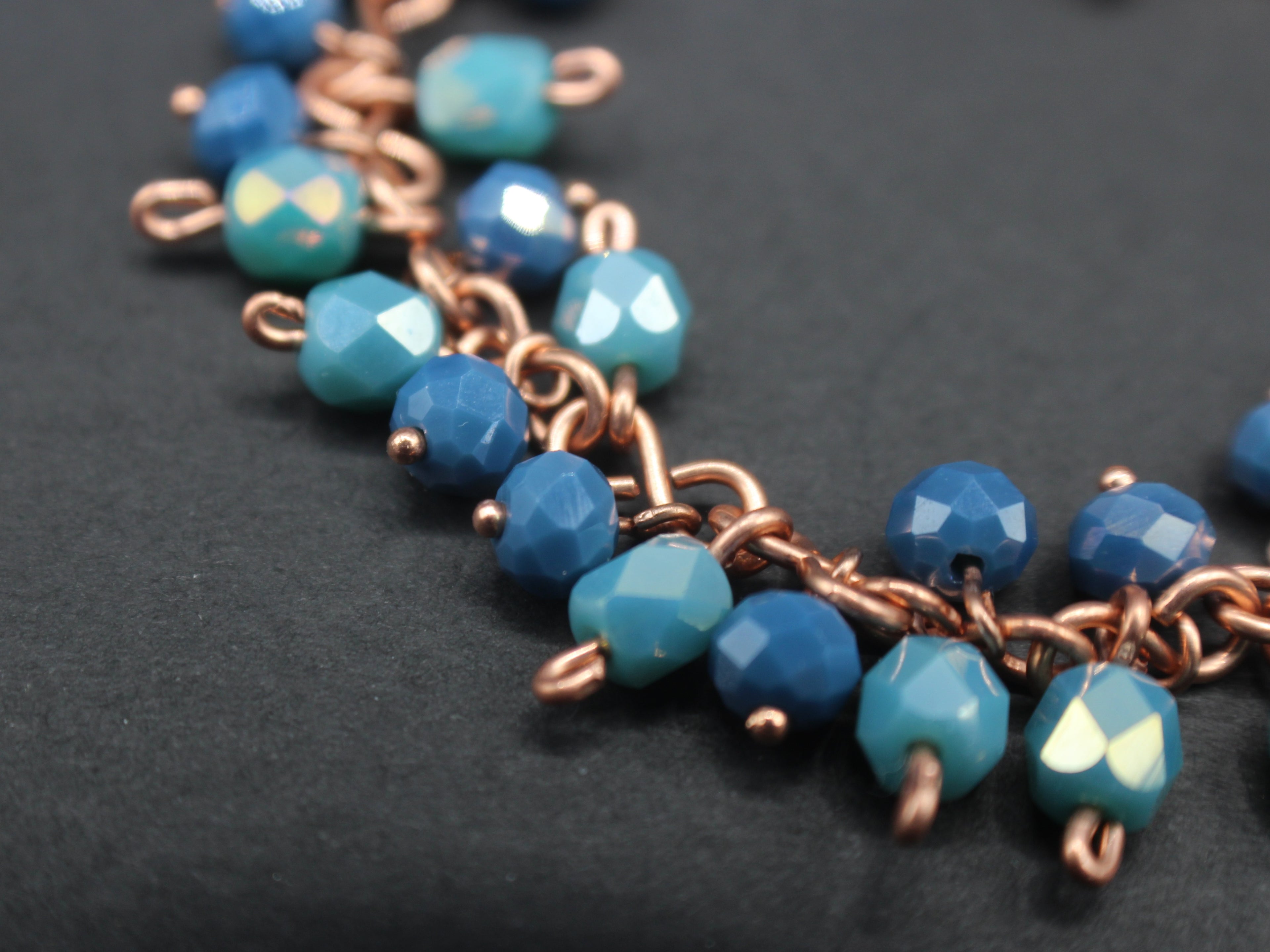 Handcrafted Blue and Aqua Faceted Glass Dangle Bracelet in Copper, 7.00"