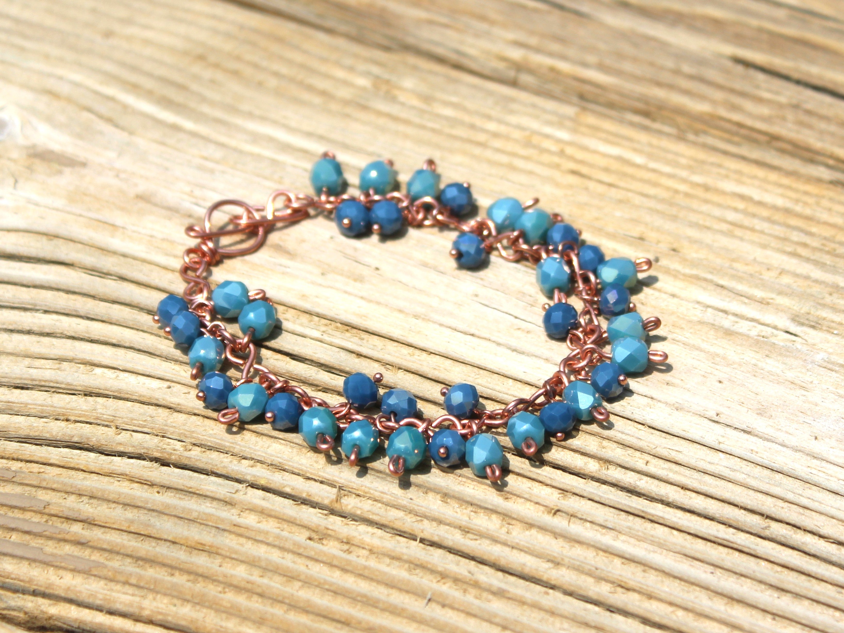 Handcrafted Blue and Aqua Faceted Glass Dangle Bracelet in Copper, 7.00"