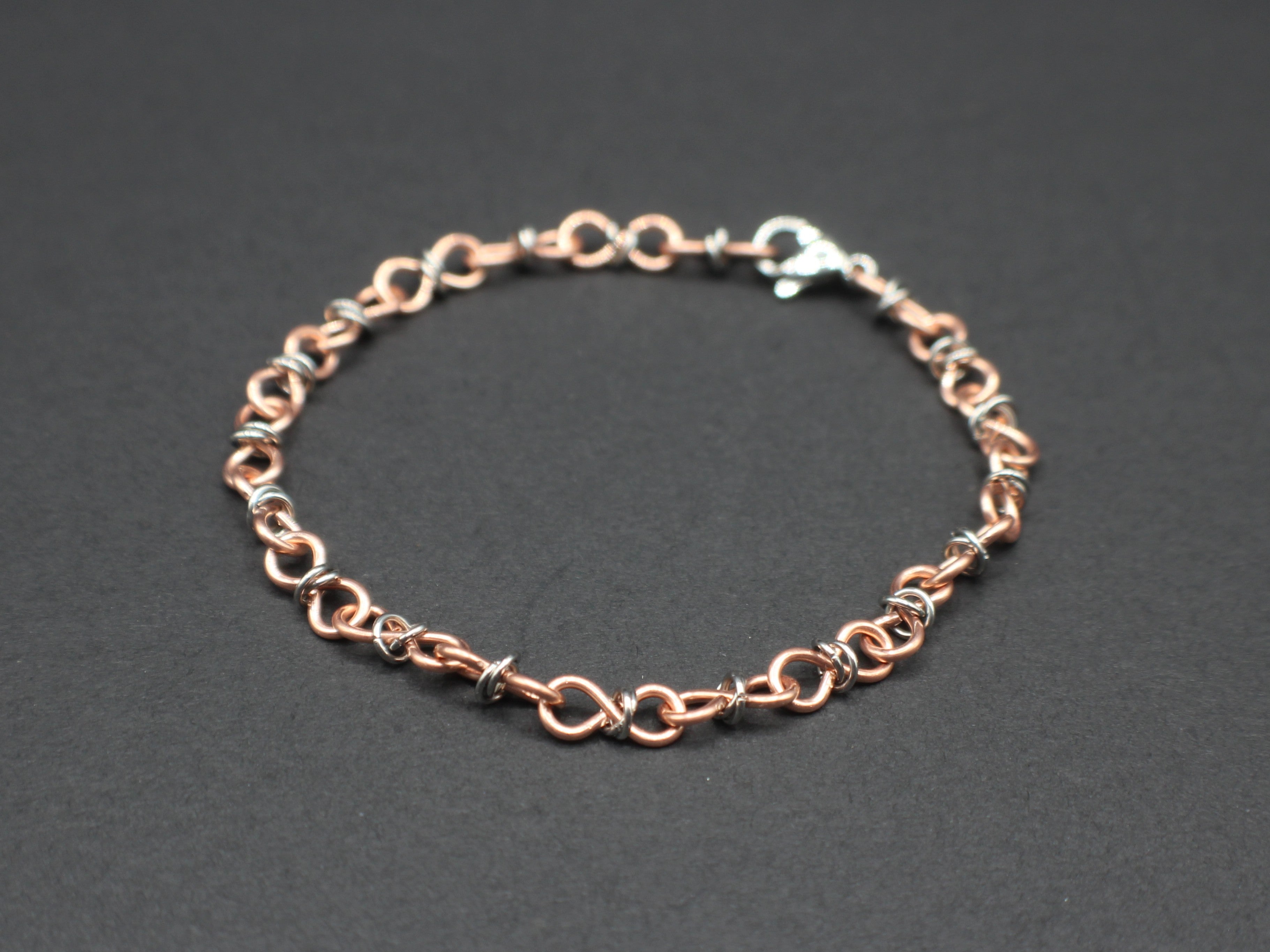 Handcrafted Copper Infinity Link Bracelet with Stainless Steel Accents, 7.00"