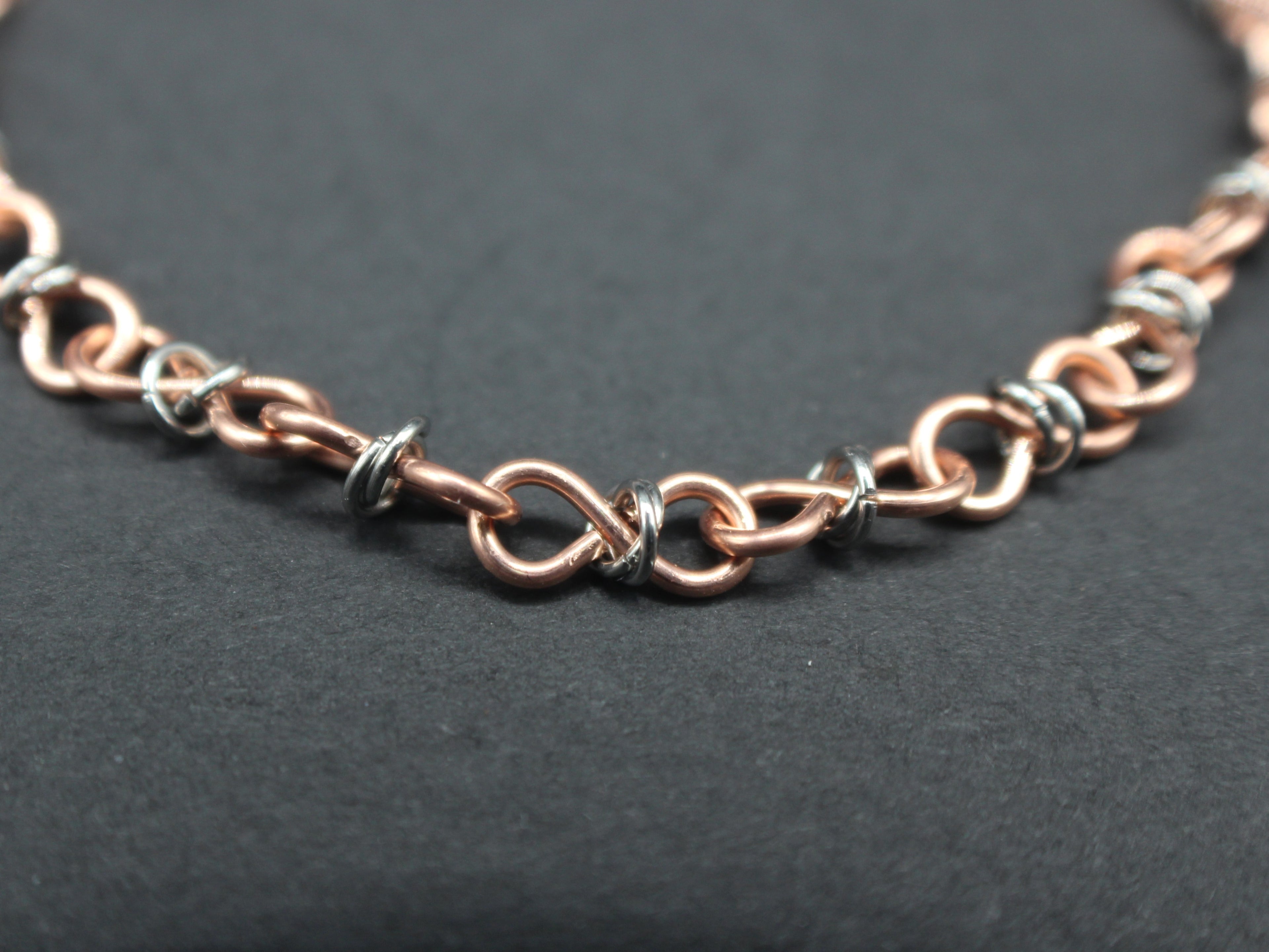Handcrafted Copper Infinity Link Bracelet with Stainless Steel Accents, 7.00"