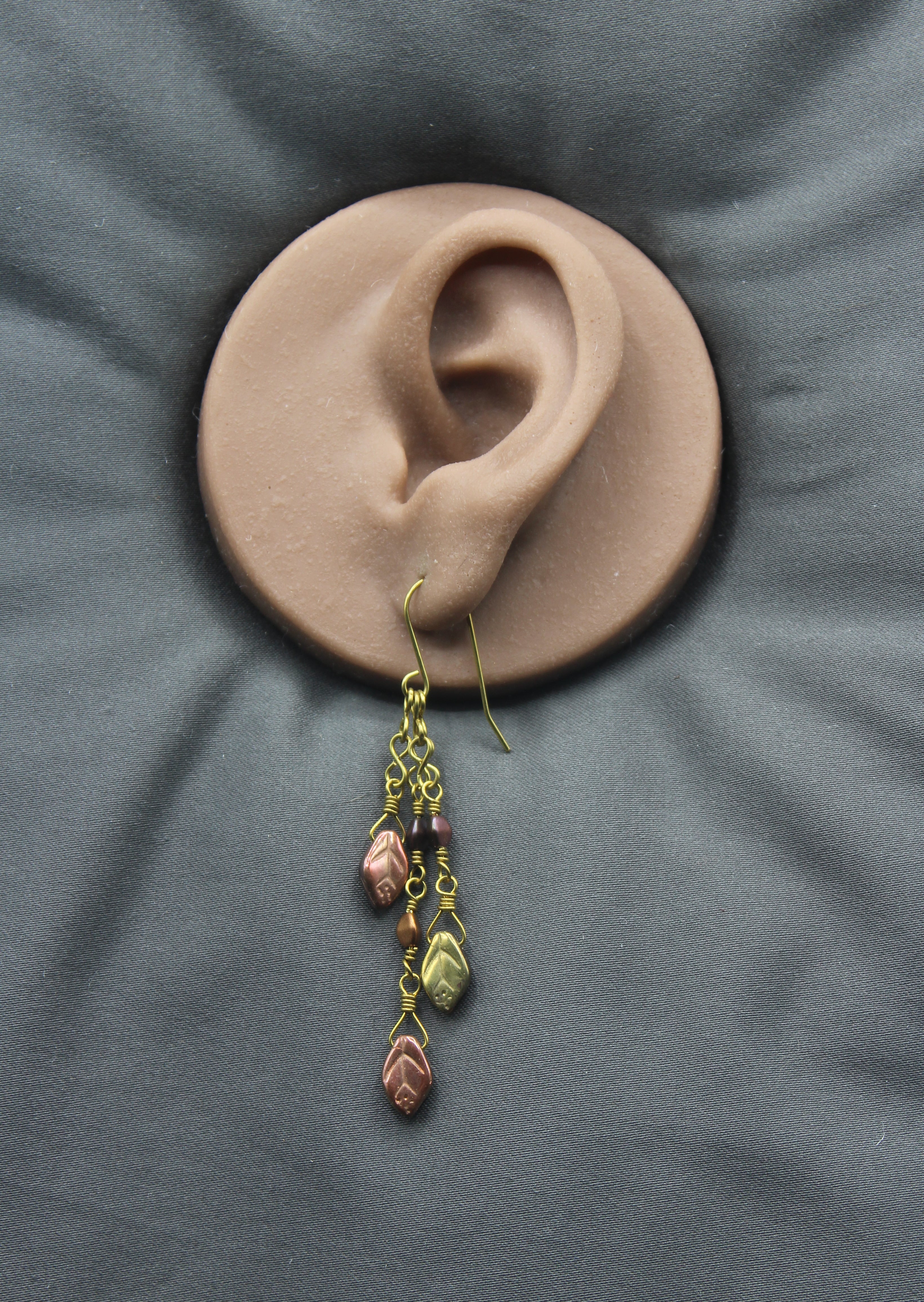 Handcrafted Brass Dangle Earrings with Metallic Czech Glass Leaf Beads